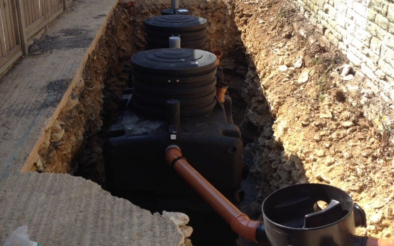 Construction site replacement of a septic tank